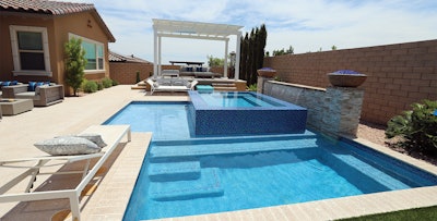 Category: SPAS BUILT IN CONJUNCTION WITH SWIMMING POOLS By: Paragon Pools, Las Vegas, Nev.