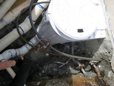 When installing the new steel reinforcement, you must maintain the bonding/electrical continuity with the existing structural steel, meaning the new steel must be connected with approved direct-burial bond clamps and #8 bare copper wire.