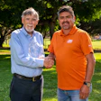 Rick English (left) receives his award with Javier Payan, Payan Pool Service.