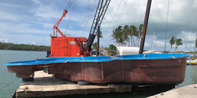 Pool and digger loaded up and ready to sail. On a clear, calm day, this barge works fine for logistical transport.