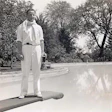 Benson Ford, son of Edsel Ford and grandson of Henry Ford, teeters above the estate’s swimming pool in 1934.