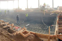 Shooting the ADA swimming pool at The Ridge at Pinehurst Assisted Living Facility, Lakewood, Colo. Significantly reduced dust in an enclosed interior allowed the contractor to use more than one nozzleman and other trades to continue working within the same space, ultimately accelerating the job.