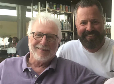 Stephen Caramello (left) with his son, Tony Caramello (right), who took over Swim Sports 15 years ago.