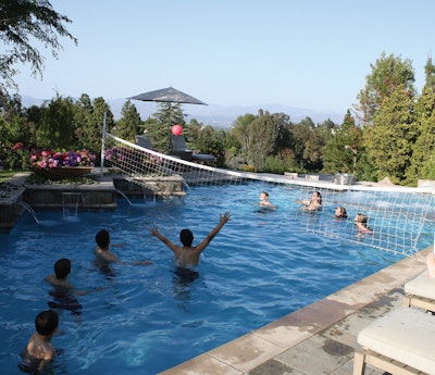 “Sport Layout” pools like this one can be outfitted with volleyball nets and basketball hoops for family fun.