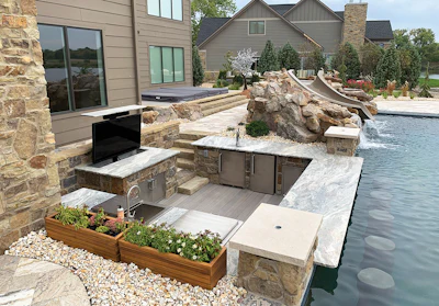 Category: POOLS WITH AUTOMATIC COVERS By: Elite Luxury Pool & Landscaping, Omaha, Neb.