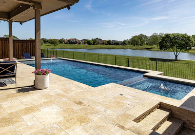 Category: TRADITIONAL By: Riverbend Sandler Pools, Plano, Texas