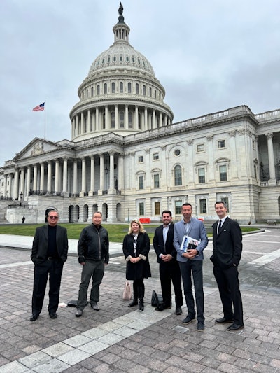 Coalition Members and staff take in the rainy day from the east side of the United States Capitol. Shown from left to right: Doug Winkler, Jeff Gormada, Laurie Flanagan, Jason Davidson, Radek Kaczor, David Beaudreau.