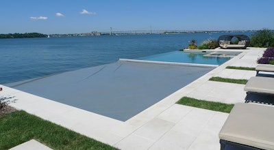 This breathtaking project using an Aquamatic pool cover comes from Paco Pools and Spas in Throgs Neck, overlooking the East River in New York.