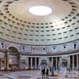 The Pantheon in Rome, with the world's largest unreinforced concrete dome, was built in the year 128 AD. That's the original concrete up there.