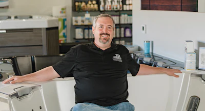The recreation facility, opened by David Isaacs (pictured above), is a multi-purpose space where employees can unwind.
