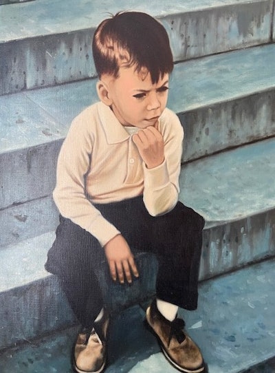 A young Eric Herman sits on the steps of the Lincoln Memorial in 1965.
