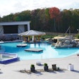 The 80,000-gallon main pool features a swim-up bar and is maintained at 87 degrees Fahrenheit year-round.