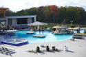 The 80,000-gallon main pool features a swim-up bar and is maintained at 87 degrees Fahrenheit year-round.