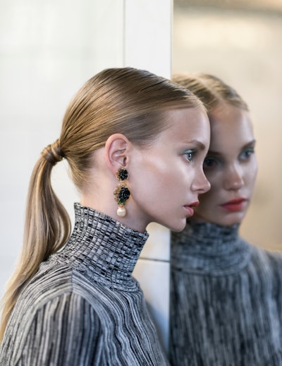 Heat and Haute Couture: Fashion Model Poses in Sauna | AQUA Magazine