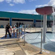 SWIMPACT! participants line up for their first swim lesson.