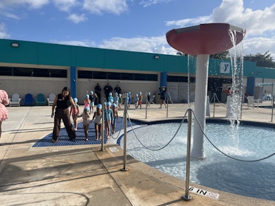 SWIMPACT! participants line up for their first swim lesson.