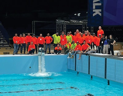 Filling the U.S. Olympic trials competition pool at Lucas Oil Stadium. A triumphant pause in the hectic 2-week project.