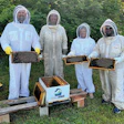The team from Georgia Spa Company takes sweet donations from tiny local workers. The honey is bound for hungry and appreciative consumers in the area, and the profits go toward education on the importance of honey bees.