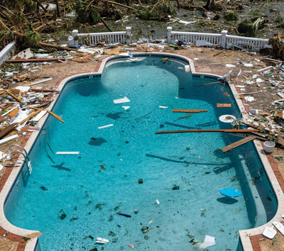 Photos documenting the state of the pool after the storm and before repairs begin are essential.