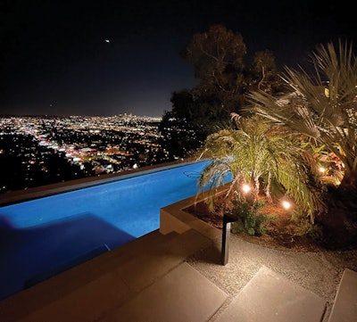 At night, the lights of Los Angeles stretch as far as the eye can see, as you take in the awe-inspiring poolside view.
