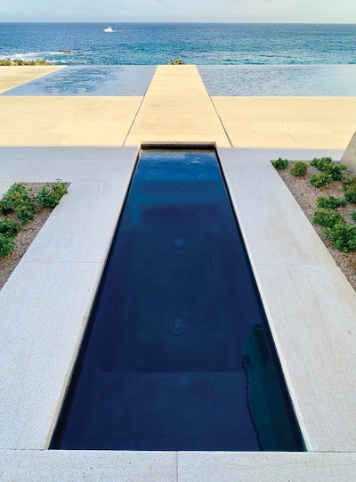Congruent shapes and a pale blue Pacific backdrop turn this cold plunge from Vision Pools into a work of art.
