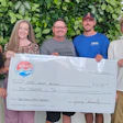 President of the Southeast Valley IPSSA chapter in Arizona, Jerry Houseman (far right) presents $10,000.00 check to the Swimming Pool Fence Program which is part of Child Crisis Arizona.
