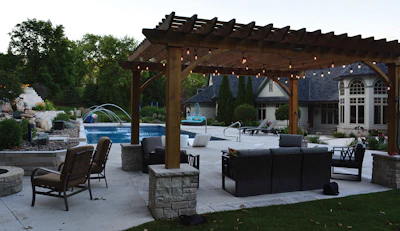 This sleek pergola brings both style and function to the backyard, offering shade and weather-ready shelter — a smart solution for Wisconsin's changing seasons.