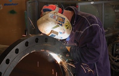 Bowker Pinnacle's Nick Wineland welds a 30-inch pump discharge line for a wastewater treatment center.