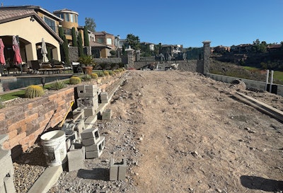 Pre-renovation shots of the client's backyard and pool, estimated to be 15 to 20 years old. Under the desert sun, the pavers reached temperatures uncomfortable for bare feet.
