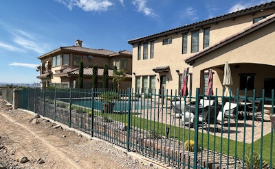 The backyard, from the same angle, before the dramatic renovation shown above.