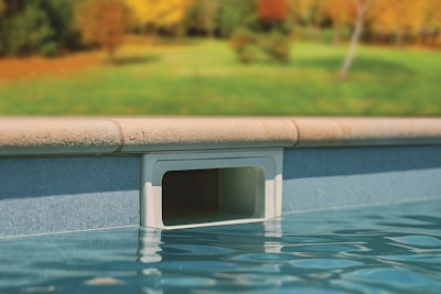 When winterizing fiberglass pools, lower water only to the bottom of the skimmer.