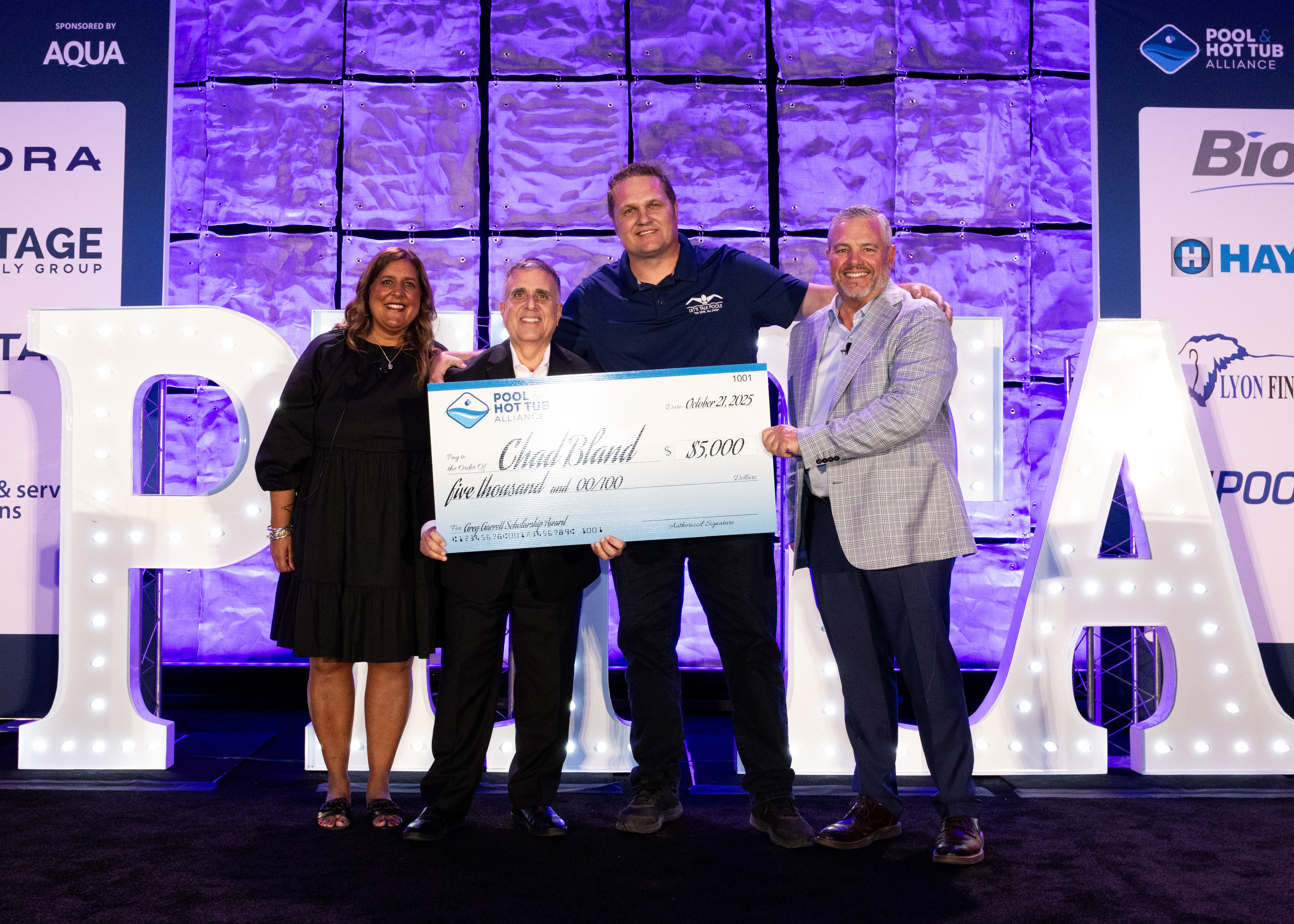 L-R: PHTA President & CEO Sabeena Hickman, CAE; Periodic Products, Inc. President & CEO Joe Laurino, PhD; Chad Bland; PHTA Board Chair Scott Frost, Heritage Pool Supply Group