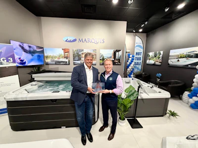 Accepting the 25th anniversary plaque are May Manufacturing executives Todd Shannon (Chief Revenue Officer) and Josh Cowley (CEO) at the company’s Las Vegas headquarters.