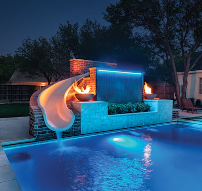A custom slide structure clad in red brick integrates multiple jump platforms and a weir wall, demonstrating how automatic cover placement can expand, rather than limit, design possibilities.