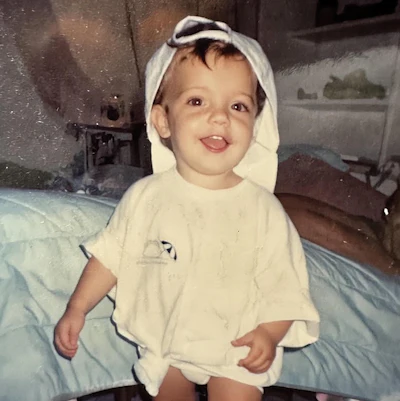 Jordon Grove (currently Horizon service manager) at 18 months — already in pool pro uniform!