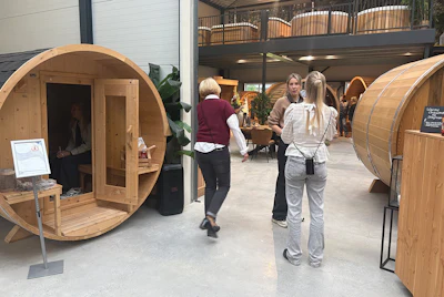 Displaying multiple sauna models in a dedicated wellness zone signals commitment and helps customers better visualize the full thermal experience.