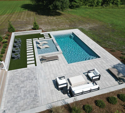 Modern fiberglass pools can now be designed with integrated spas, tanning ledges and outdoor living areas, giving homeowners the high-end features once more commonly associated with concrete construction.
