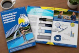 Pool maintenance product catalogs and equipment accessories displayed on wooden desk with coffee and plant