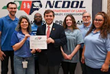 From left to right: Max Wascher, Jennifer Brown, Zedrick Bass, NCDOL Commissioner Farley, Cheyenne Brown, Michael Stephens, Tiffany Bryant